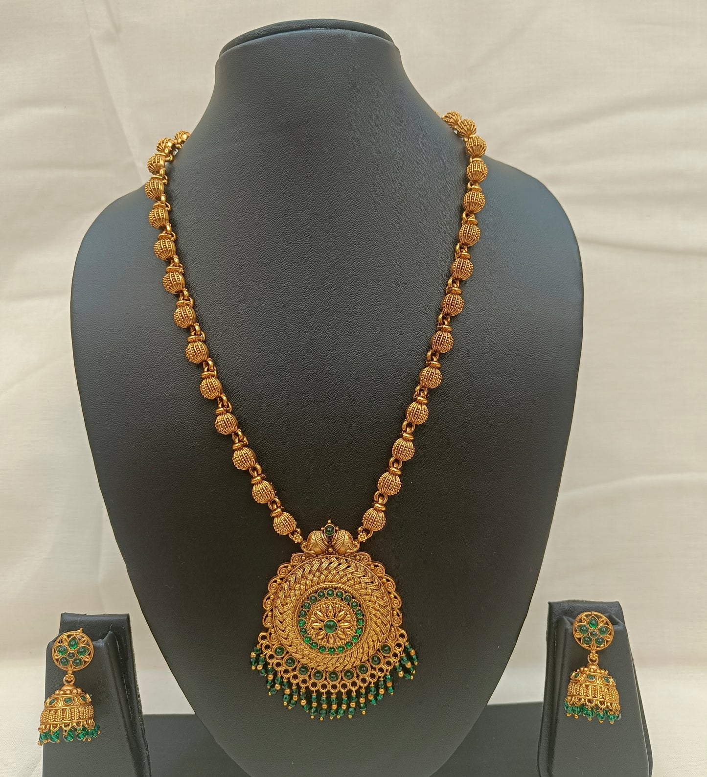 ✨ Antique Gold Lakshmi Pendant Necklace Set with Green Bead Detailing ✨