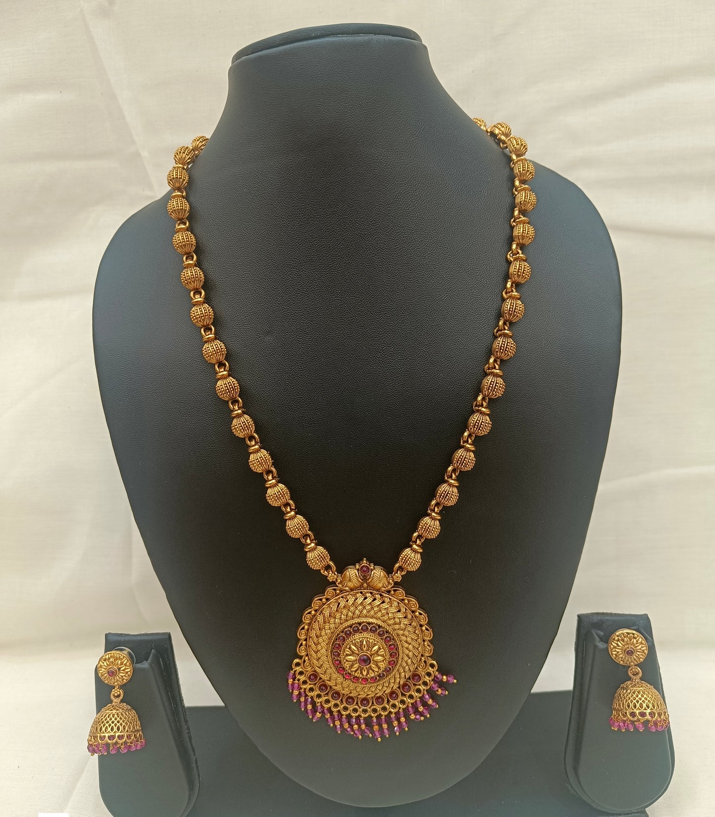✨ Antique Gold Lakshmi Pendant Necklace Set with Ruby Bead Detailing ✨